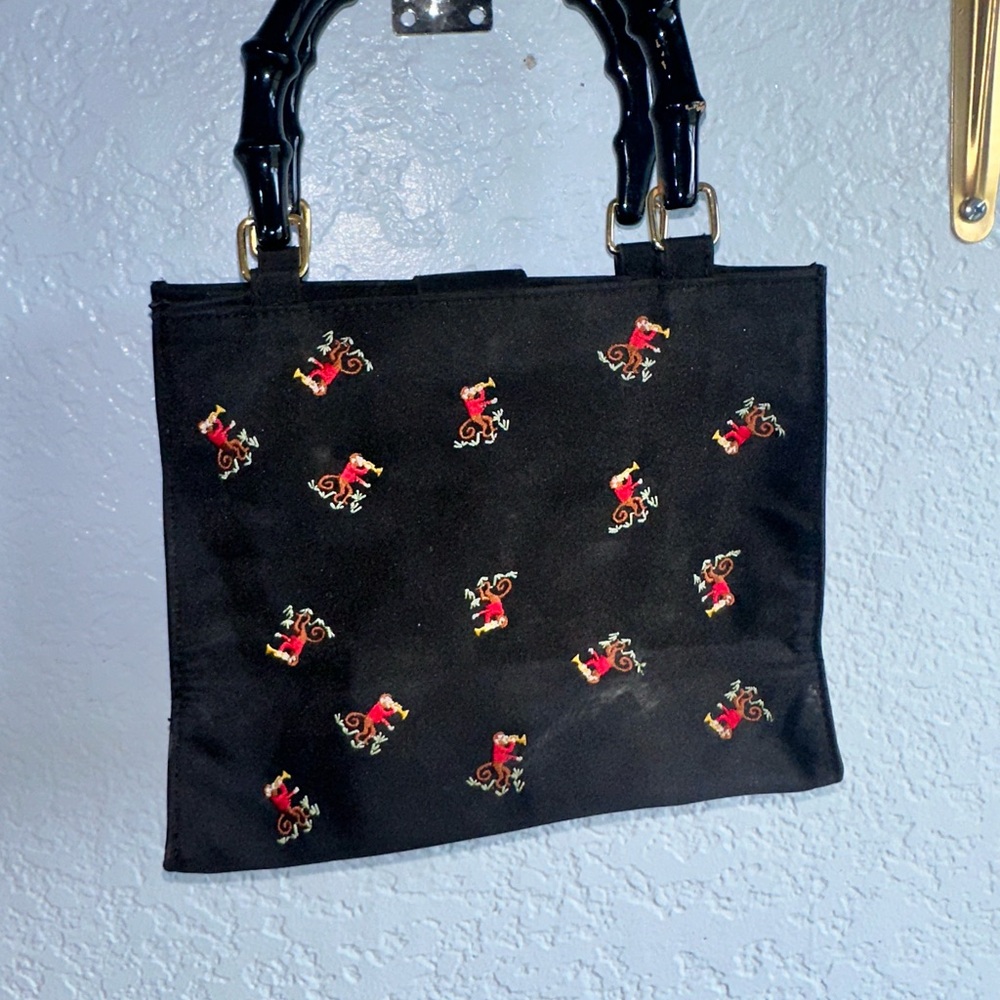 Elegant Black and Red Totes with Bold Pattern